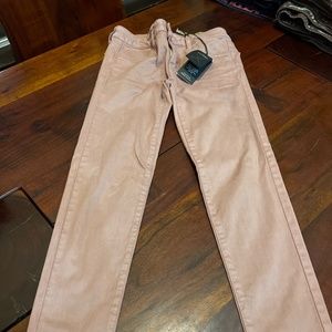 American Eagles Super Stretch Jean A color is more of a MAUVE